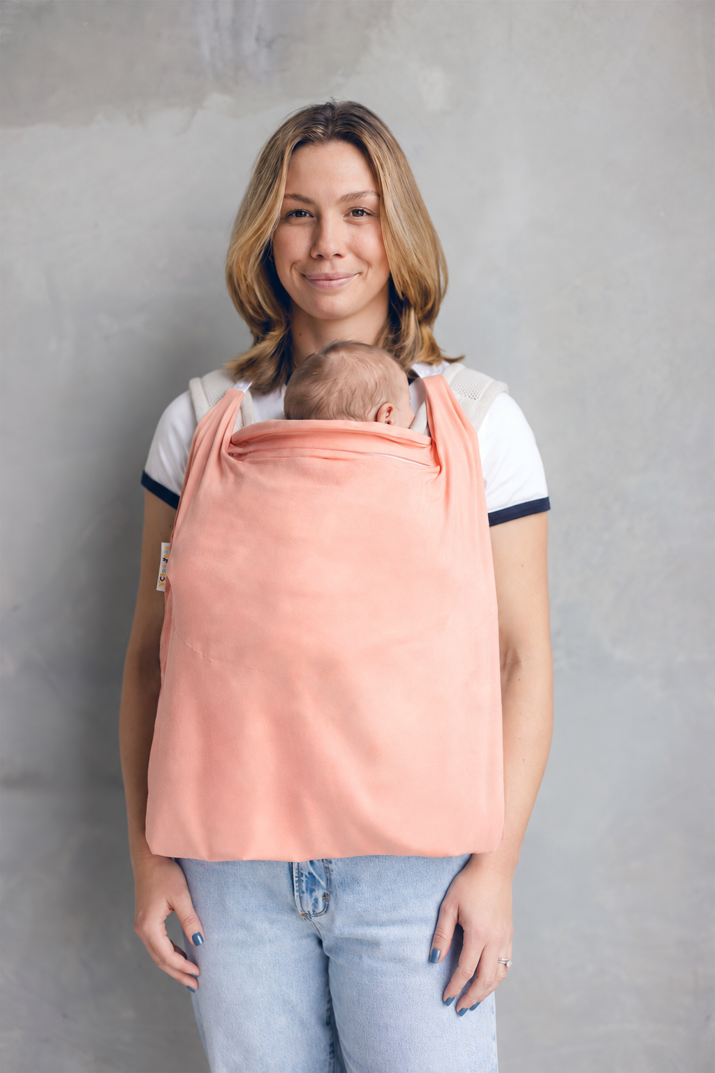 Mum babywearing with Desert Ochre Shady Baby UPF50+ carrier sun cover